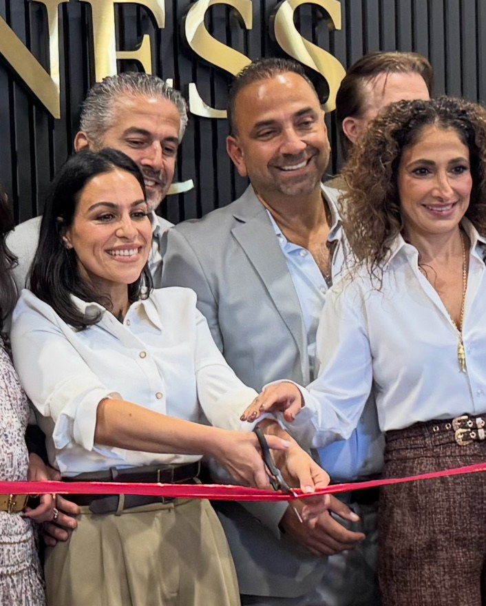 Dr. Sheila Omrani and Nurse Lisa Farazmand cutting the ribbon at the opening of their Great Neck practice.